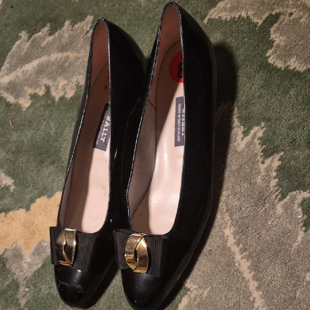 Bally Women's Black Patent Leather Loafers with Gold Buckle